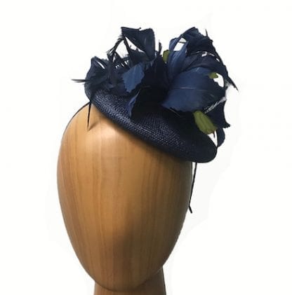 navy with green fascinator