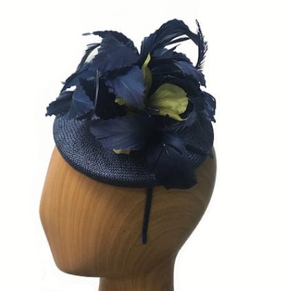 navy with green fascinator