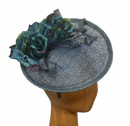 teal fascinator with teal flowers