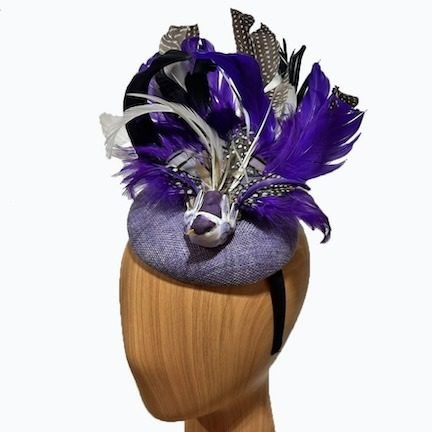 purple bird feathered fascinator
