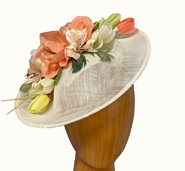 white pastel flower fascinator