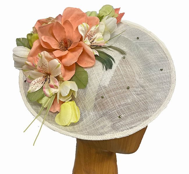white pastel flower fascinator