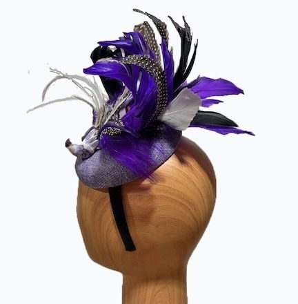 purple bird feathered fascinator