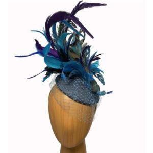 Blue peacock feathered fascinator